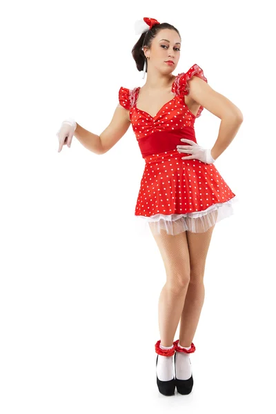 De jonge vrouw poses in een rode jurk. — Stockfoto