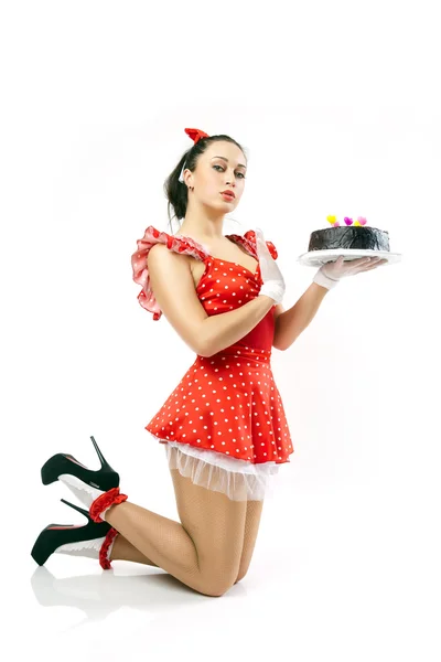 Jeune belle femme avec un gâteau . — Photo