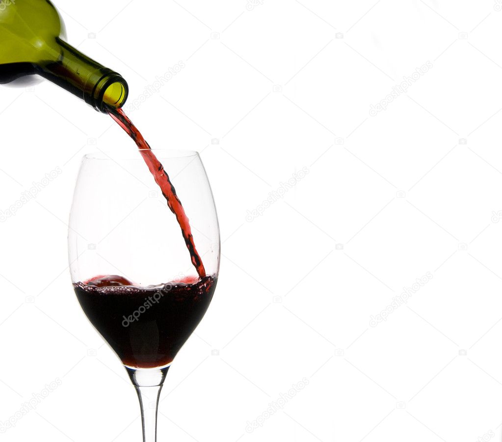 A clear glass of red wine isolated on white background