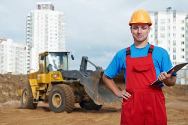 Builder inspector at construction area clipart