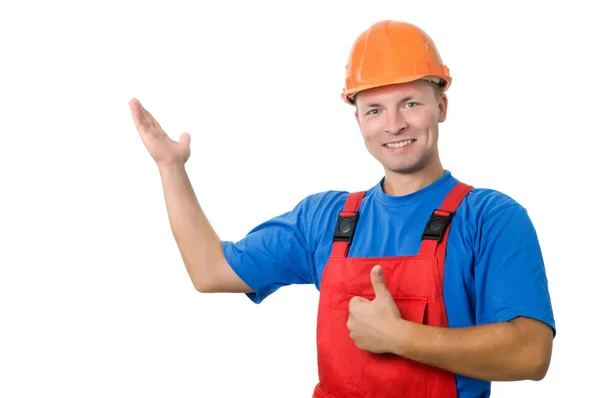 Builder in uniform pointing up — Stock Photo, Image