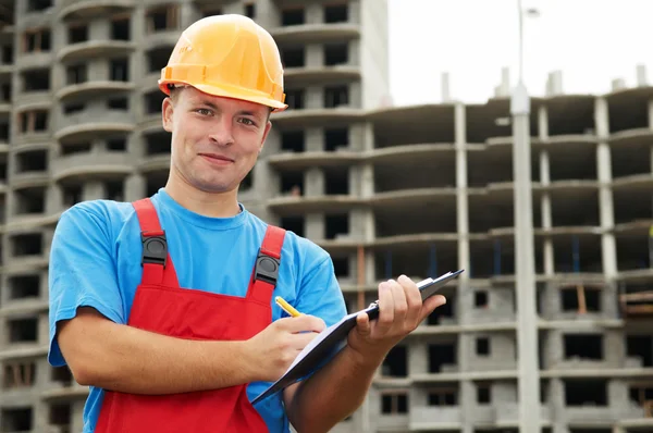 Builder satisfied inspector at construction area — Stock Photo, Image