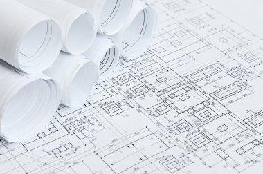 Rolled papers of design drawings clipart