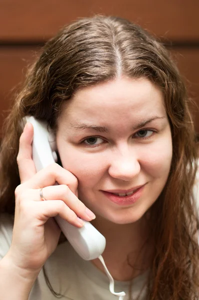 The young girl calling by phone. — Stock Photo, Image