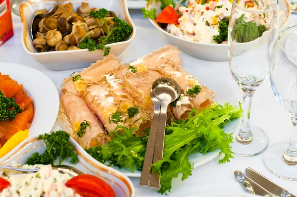 stock image Plates with cold snack on table, cutlery for dinner