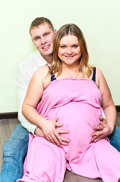 Pregnant Woman Her Husband Sitting Floor Empty Room Caucasians Loving — 스톡 사진