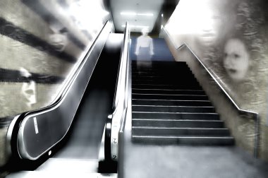 Creepy escalator with geist faces clipart