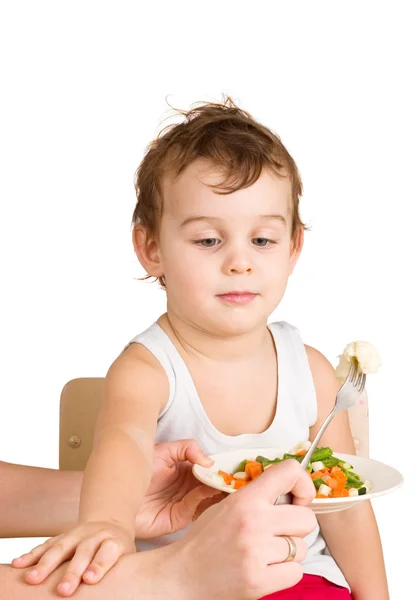 Kid does not want to eat salad — Stock Photo, Image