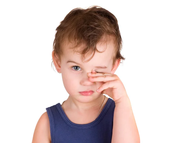 A tired little boy rubbing eyes — Stock Photo, Image