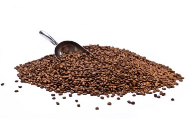 Metal scoop partially burried in coffee beans heap clipart