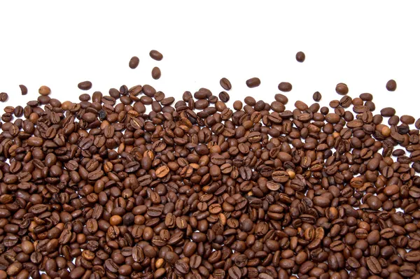 Смажені кавові зерна фон — стокове фото
