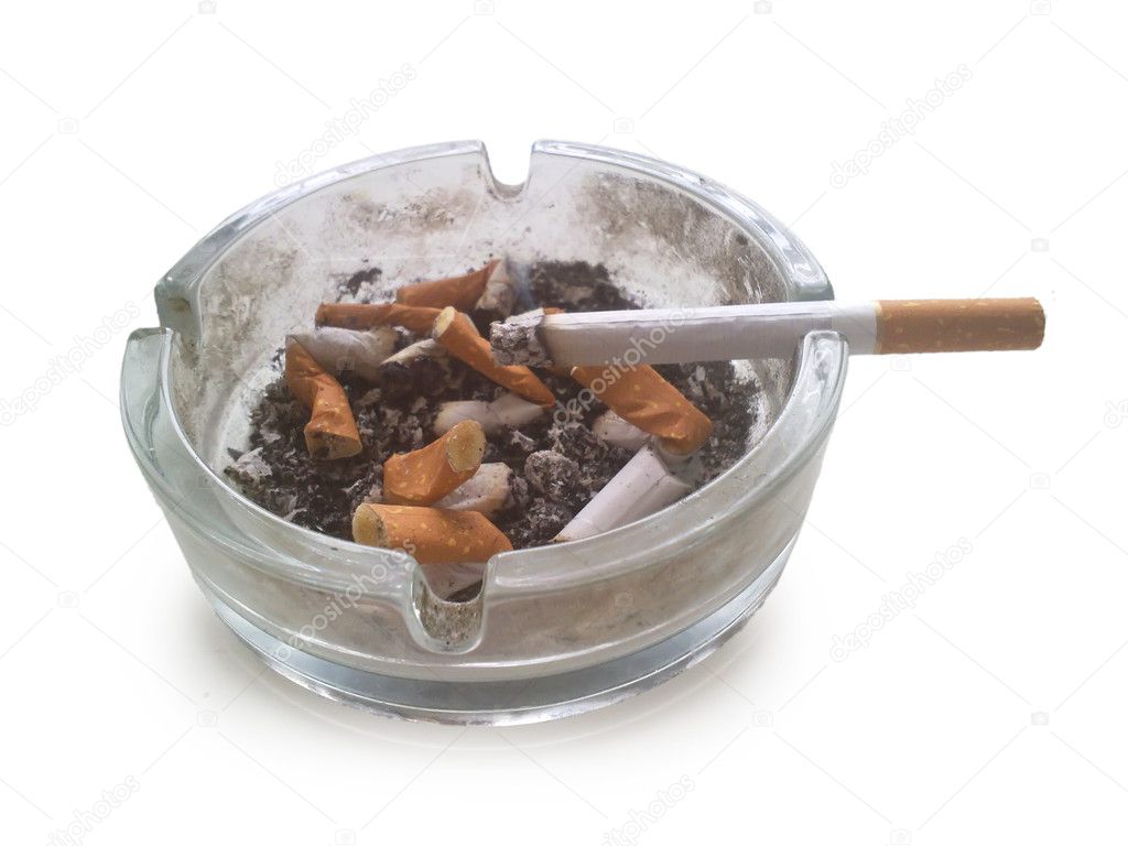 Smoking a cigarette in an ashtray