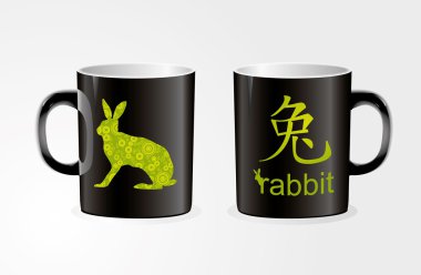 Mug with zodiac symbol of the rabbit of the year clipart