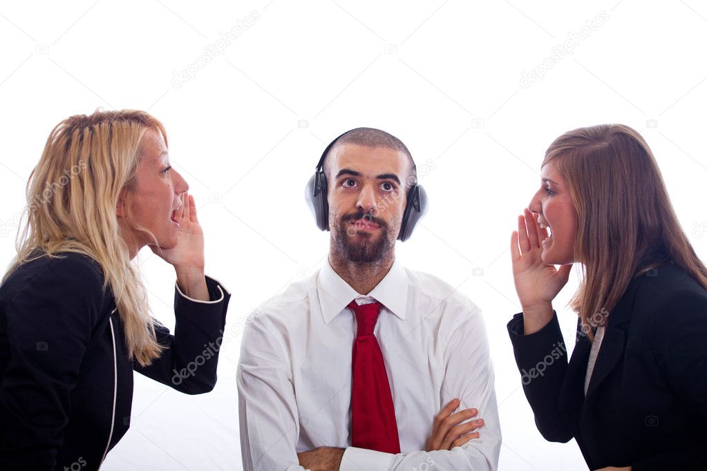 Businessman with Ear Protectors between Two Screaming Businesswoman