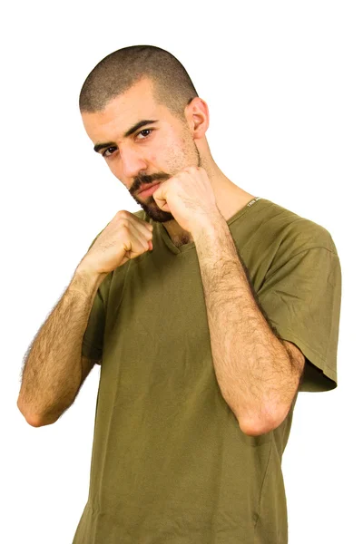 Jovem agressivo homem mostrar seus punhos — Fotografia de Stock
