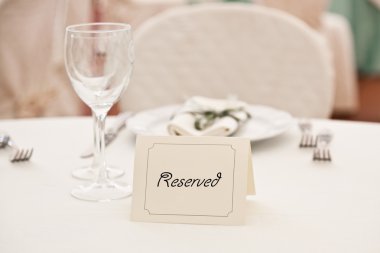 Booked Place in Elegant Restaurant clipart