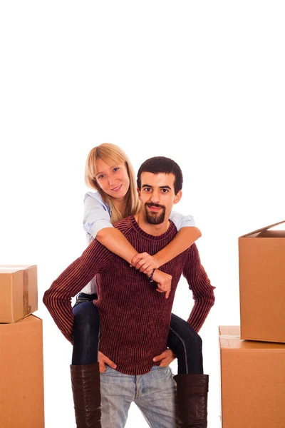 Young Couple on Moving - Man Piggybacking Woman — Stock Photo, Image