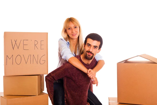 Young Couple on Moving - Man Piggybacking Woman — Stock Photo, Image