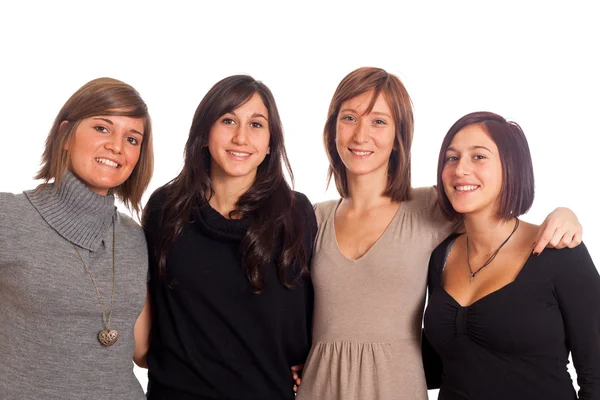Quattro donne felici con le mani sulle spalle — Foto Stock