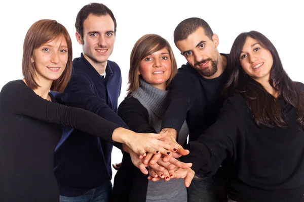 Glücklicher junger Erwachsener mit Händen auf Stapel — Stockfoto