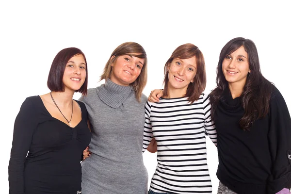 Cuatro mujeres felices con manos en los hombros —  Fotos de Stock