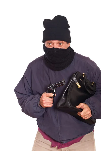 Ladro che punta una pistola su una rapina — Foto Stock