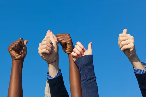 Multiracial Thumbs Up Against Blue Sky — Stock Photo, Image