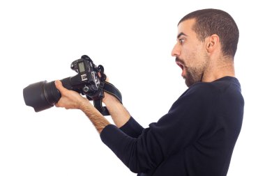 Young Man Photographer Looking Camera's Display clipart