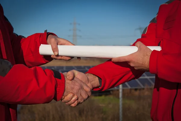 Engineer Handshake Plans Delivery — Stock Photo, Image