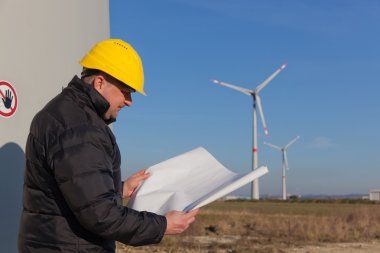 Technician Engineer in Wind Turbine Power Generator Station clipart