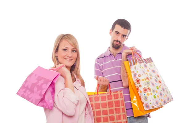 Junges Paar mit Einkaufstüten — Stockfoto
