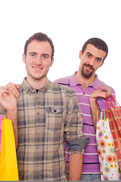 買い物袋と若い同性愛者のカップル — ストック写真