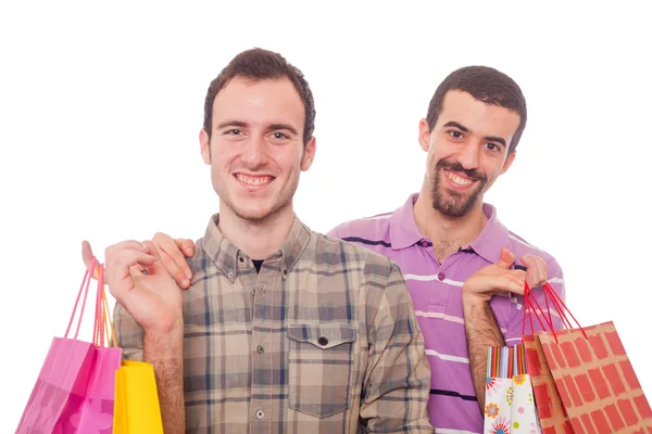 Jonge homoseksueel paar met shopping tassen — Stockfoto