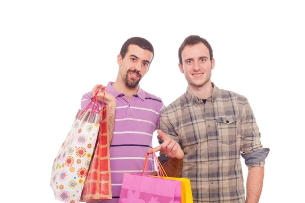 Jeune couple homosexuel avec sacs à provisions — Photo