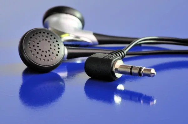 Audio jack and headphones — Stock Photo, Image