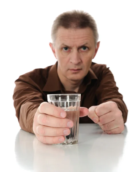 Man and glass with water. — Stock Photo, Image