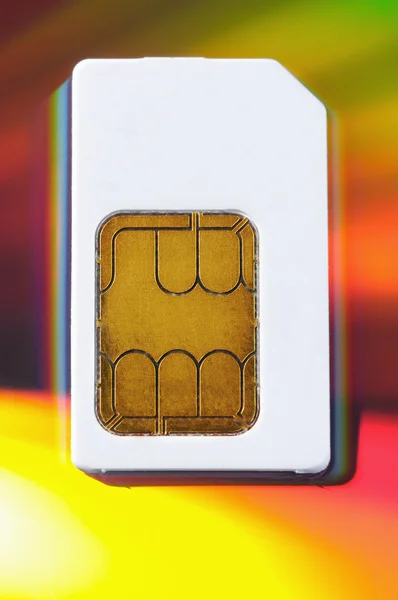 White Sim Cards Multi Coloured Background — Stock Photo, Image