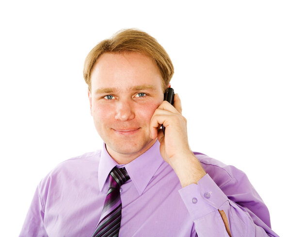 Businessman talking on cell phone isolated