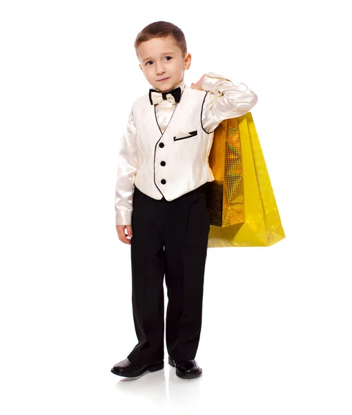 Boy holding presents — Stock Photo, Image
