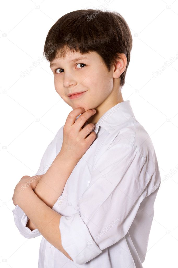Little serious boy portrait isolated on white