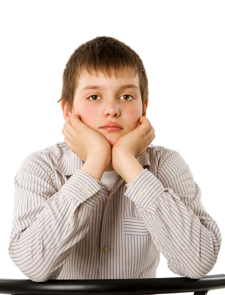 Bored Ten Years Boy Sitting Isolated White — Stock Photo, Image