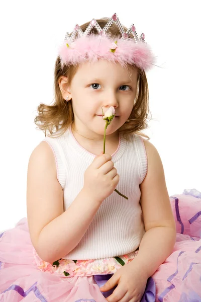 Dziewczynka gospodarstwa róża — Zdjęcie stockowe