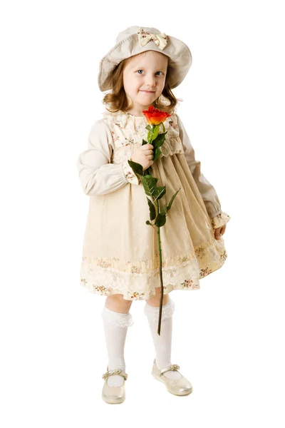 Κοριτσάκι Που Κρατάει Τριαντάφυλλο Φορώντας Καπέλο Στέκεται Απομονωθεί Λευκό — Φωτογραφία Αρχείου