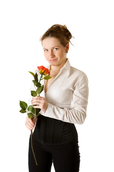 Женщина держит розу — стоковое фото