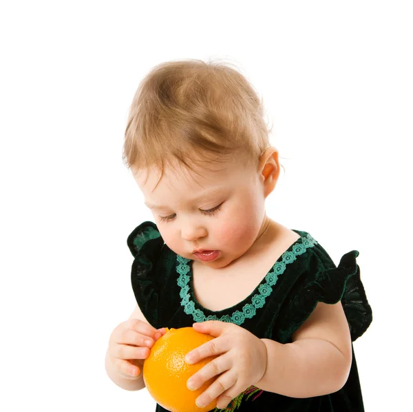 Child with orange — Stock Photo, Image