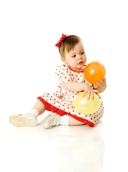 Girl holding balloon — Stock Photo, Image