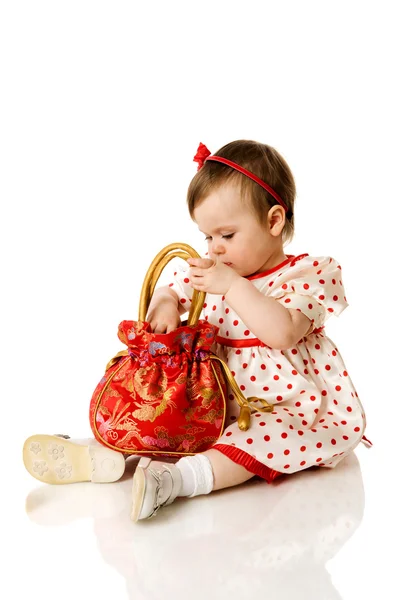 Girl holding purse — Stock Photo, Image