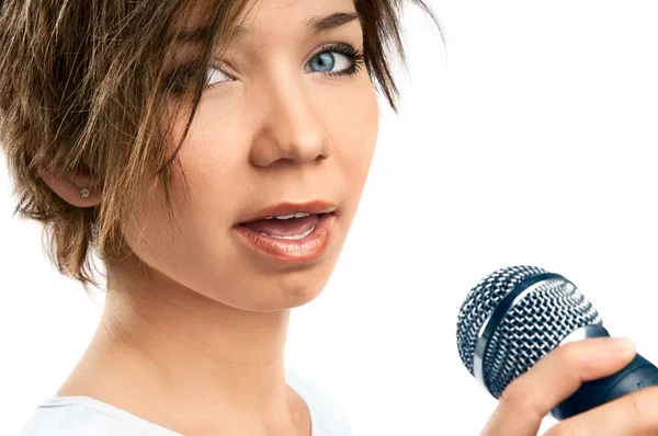 Menina cantando no fundo branco — Fotografia de Stock