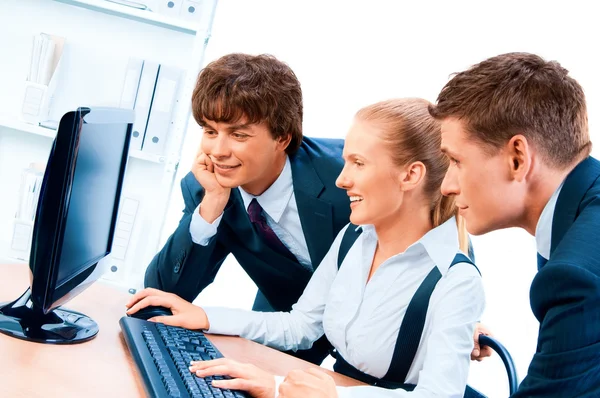 Three young successful businesspeople. Screen has a clipping pat — Stock Photo, Image