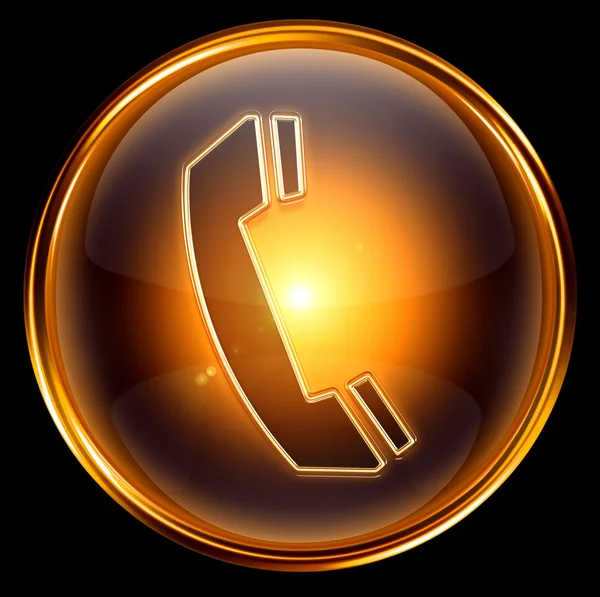 Icono del teléfono oro, aislado sobre fondo negro . — Foto de Stock